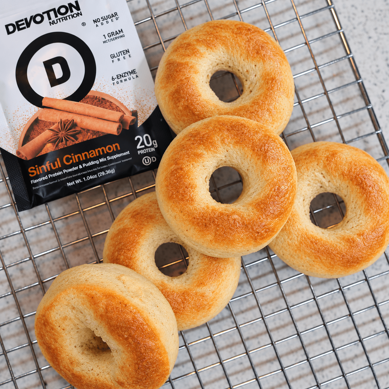 Devotion nutrition symbol, cinnamon protein powder with five protein bagels