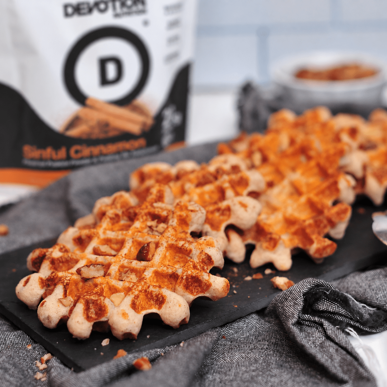 High protein, mini cinnamon, pecan waffles made with Devotion Nutrition sinful, cinnamon protein powder