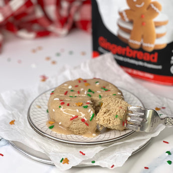 Two packages of Devotion Nutrition Gingerbread flavored erbread on a white background