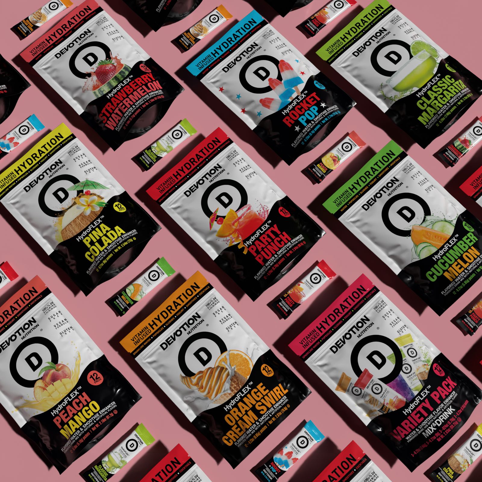 Devotion Nutrition HydroFlex hydration flavors and variety packs displayed on pink.