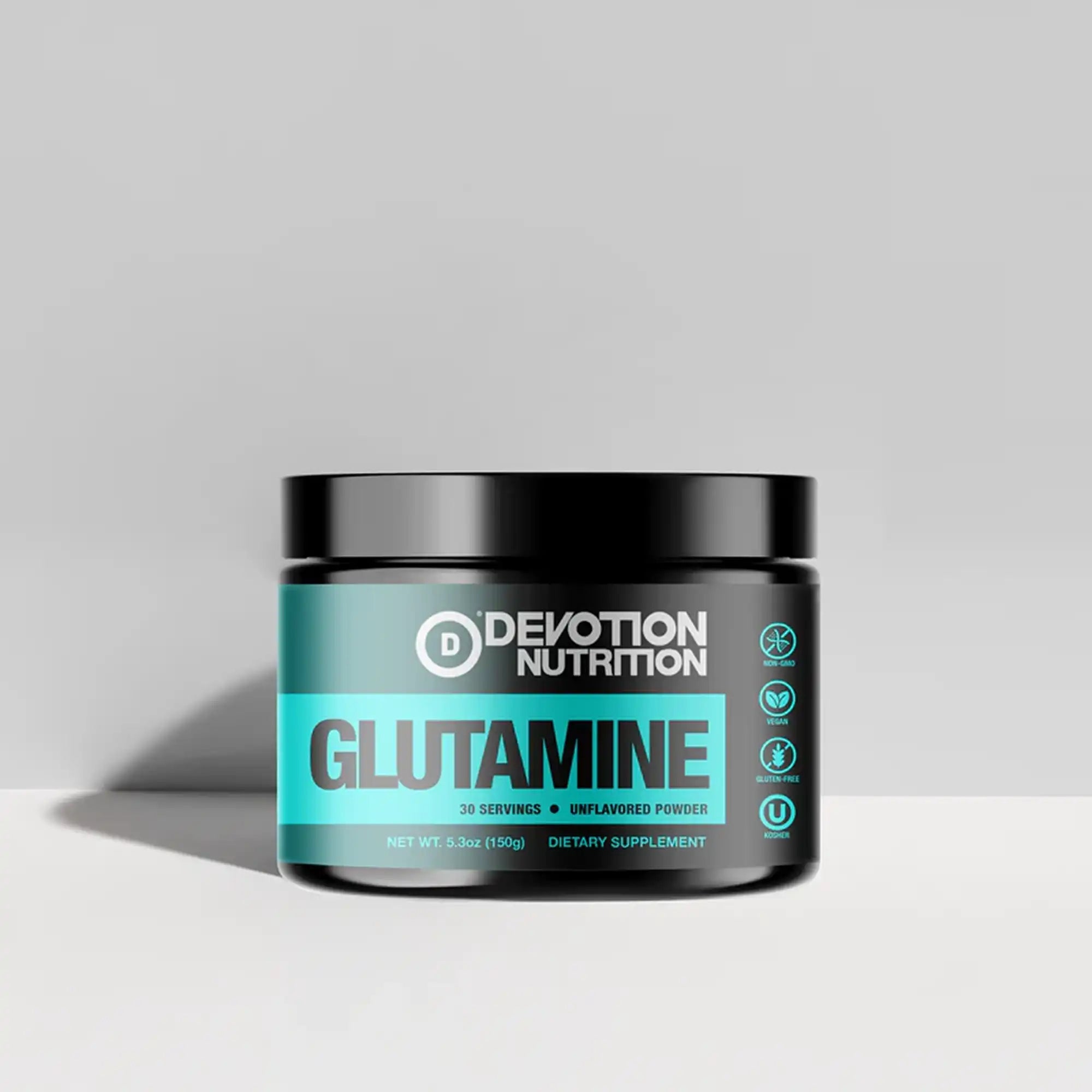 Devotion Nutrition Glutamine supplement container on a gray background