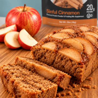 Devotion Nutrition Sinful cinnamon protein apple cinnamon mini loaves on a cutting board