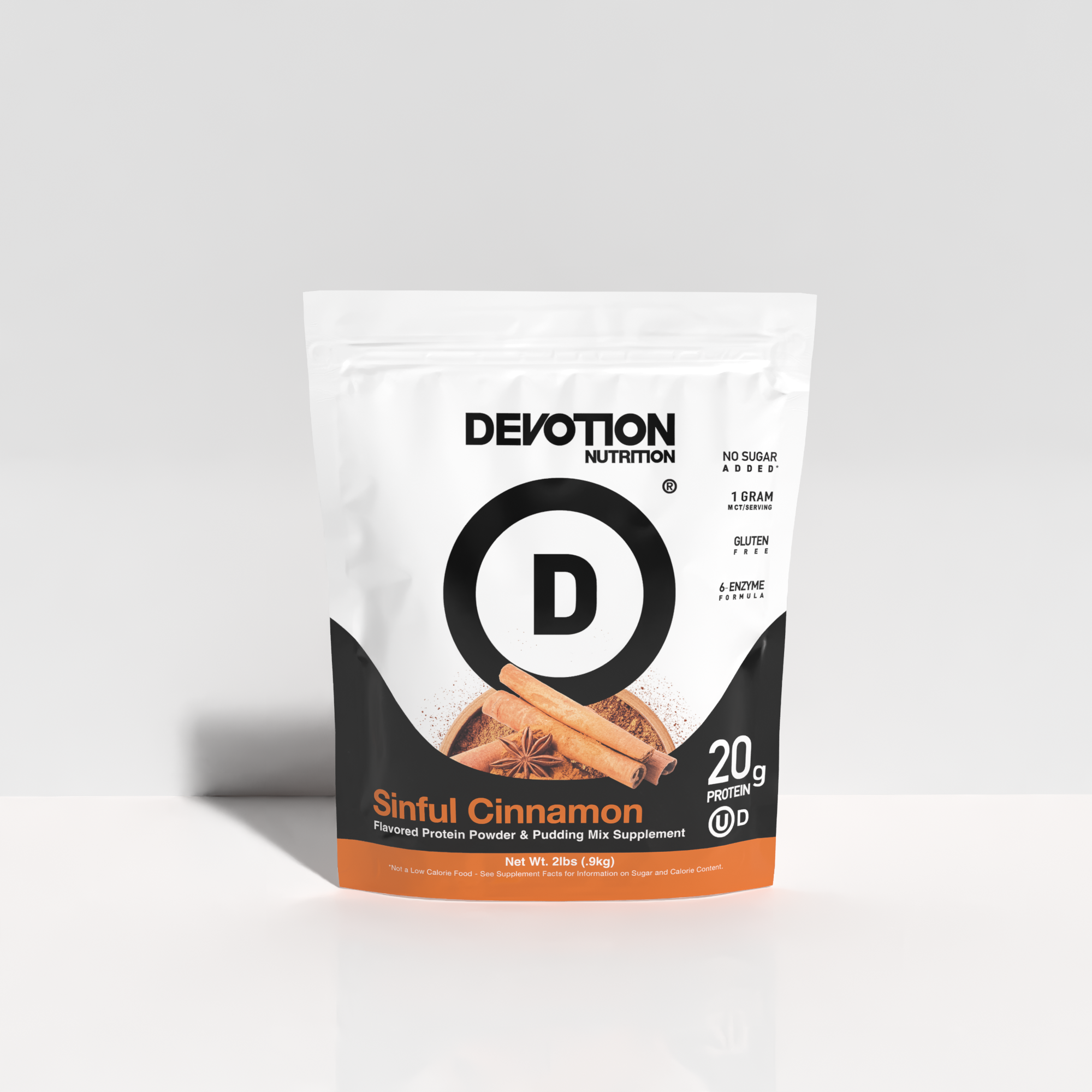 Devotion Nutrition Sinful Cinnamon protein powder package on a light gray background