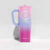 Gradient pink to purple Devotion Ice Shaker Bottle with lavender handle on a light gray background
