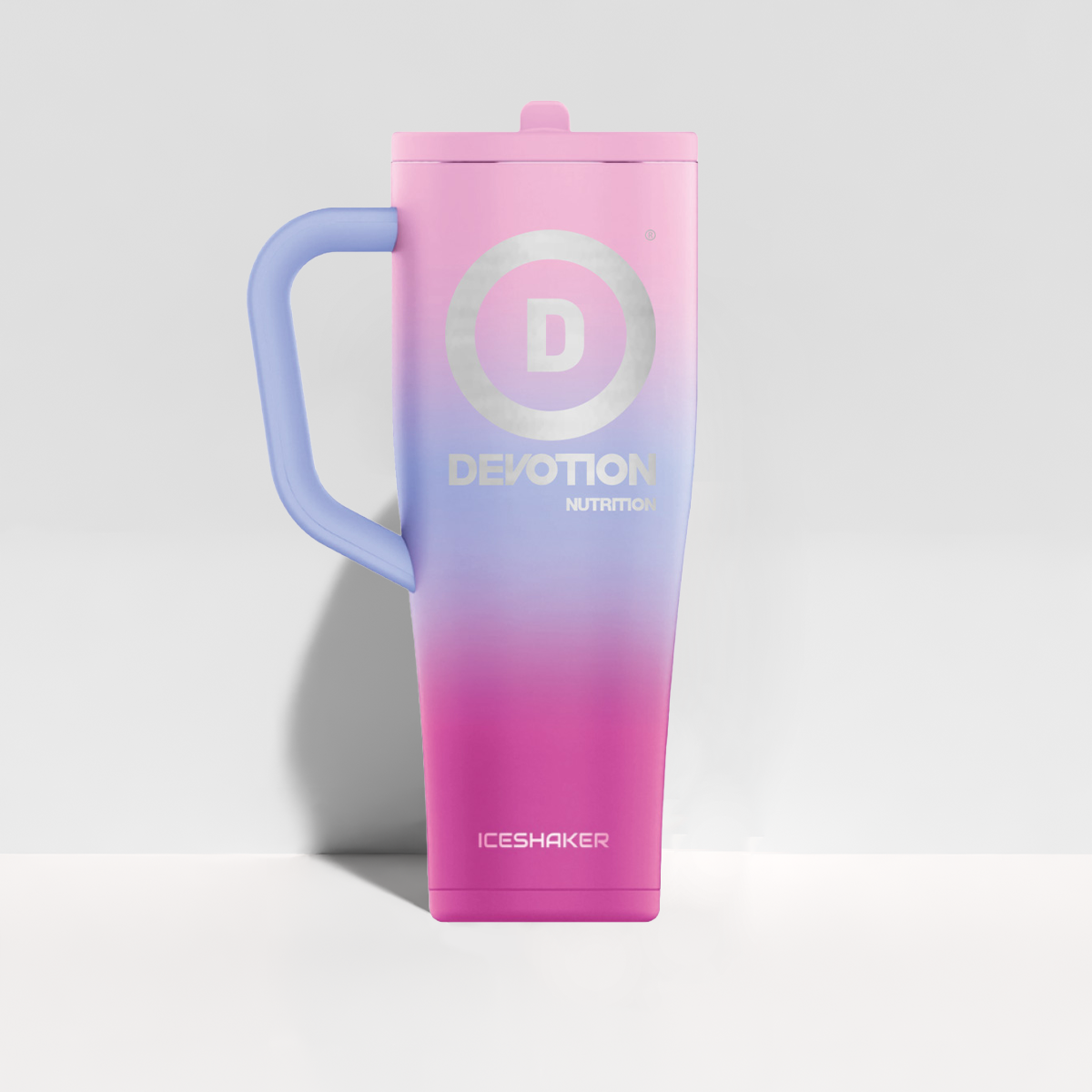 Gradient pink to purple Devotion Ice Shaker Bottle with lavender handle on a light gray background