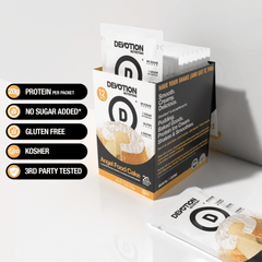 An image of the Devotion Nutrition | Angel Food Cake Protein Powder Packets 12-Pack Box with 5 callouts, 20g protein per serving, no sugar added, gluten free, kosher and third party tested labels to left.