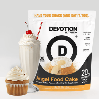 Devotion Nutrition Angel Food Cake protein powder package with a milkshake and cupcake on a light gray background