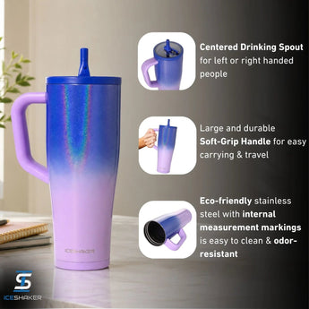 A tall handled tumbler with a purple lid and straw  featuring a purple-to-lavender gradient body and a gray 'D Devotion Nutrition' logo on the front  set against a light gray background.