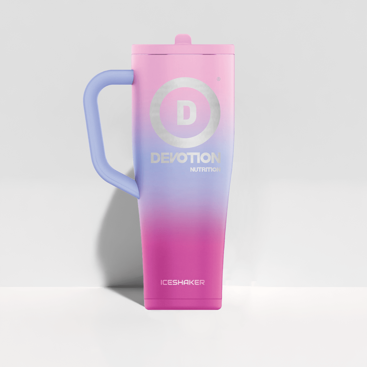 Gradient pink to purple Devotion Ice Shaker Bottle with lavender handle on a light gray background