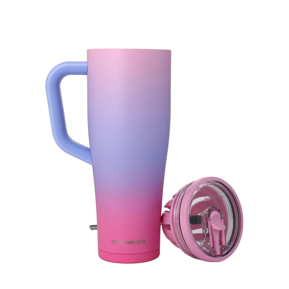 Gradient pink to blue tumbler with handle and lid on a white background