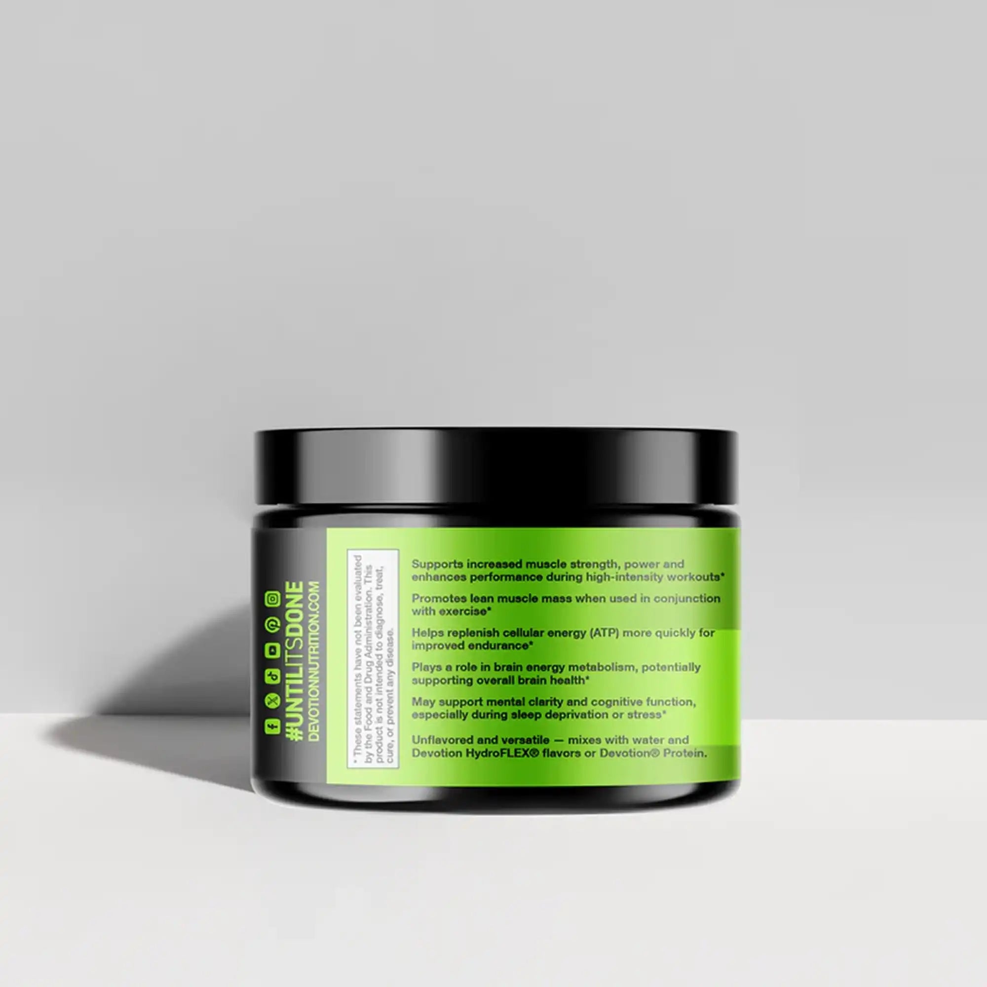 Devotion Nutrition Creatine powder container on a gray background