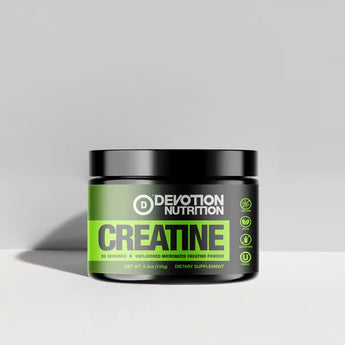 Devotion Nutrition Creatine powder container on a gray background